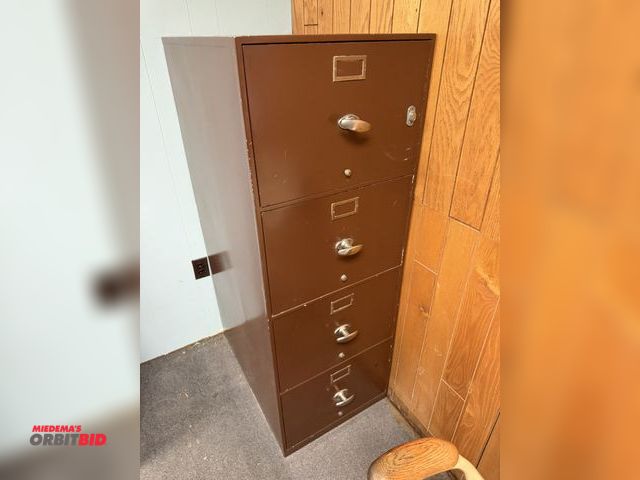Lot 1-15527 - (1) 4-drawer fire proof file cabinet, 20 1/4" width x 30.5" depth x 56" height, will include keys.