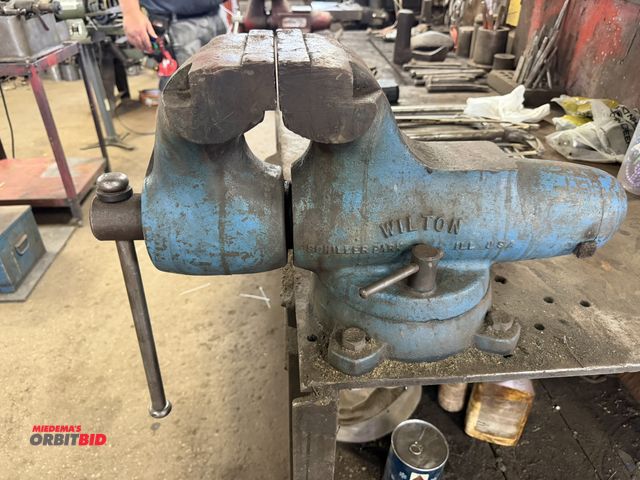 Lot 1-18576 - (1) Wilton bench vise, #09-600, 6" wide jaws, currently bolted to work bench, winning bidder respons...