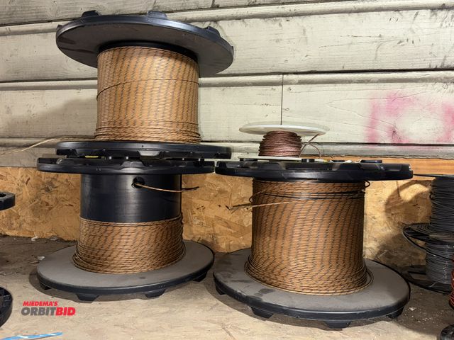 Lot 1-4514 - Lot of (4) partial spools of coax wire.