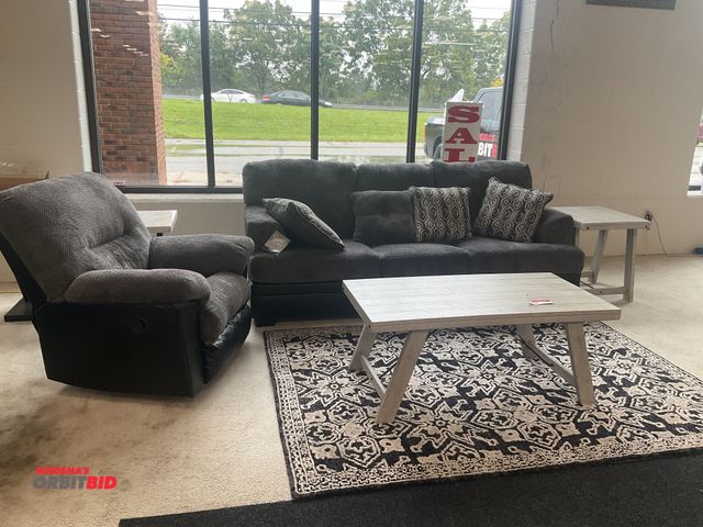 Lot 1-17150 - New Signature Design by Ashley living room set. Couch is 90” long by 40” deep. Coffee table is 48” b...