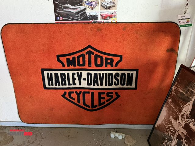 Lot 1-8205 - (1) approx. 70" length x 48" width Harley Davidson Motorcycles rug.