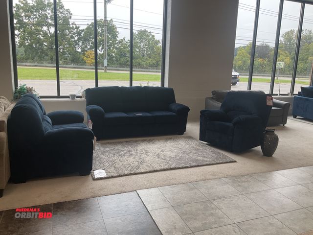 Lot 1-17160 - Signature Design by Ashley living room set. Couch is 80” by 37” deep. Loveseat is 57” by 37” deep. R...