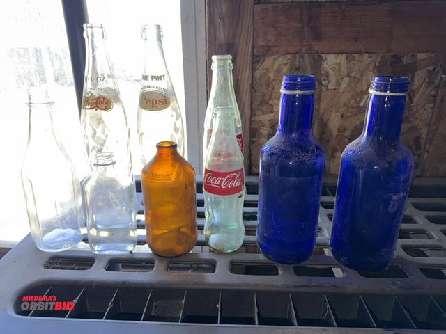 Lot 1-8329 - Lot of assorted vintage bottles.