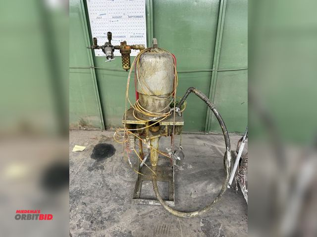 Lot 1-17195 - (1) Graco Bulldog airless paint sprayer with hose, cart, and Nordson paint gun.