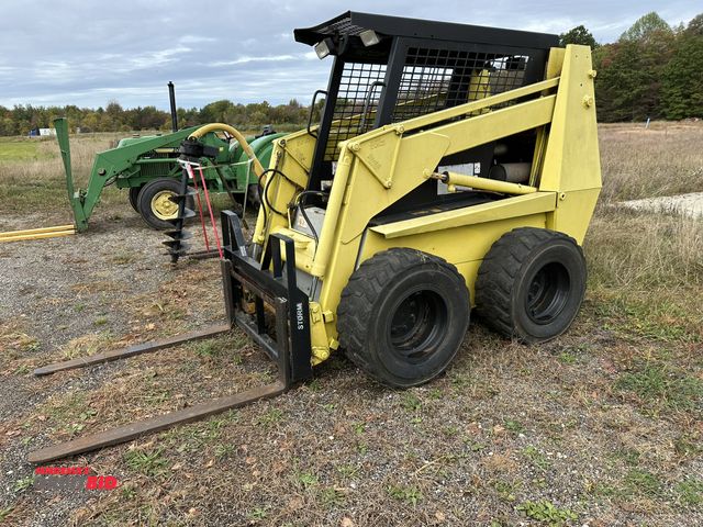 Lot 1-14743 - (1) Case, model 1845C, skid steer with diesel engine, 4000 lb. capacity fork attachment with 4" x 48...
