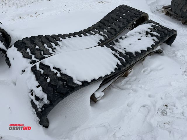 Lot 1-11691 - Lot of (2) skid steer tracks, 17.5" wide x approx. 82" diameter.