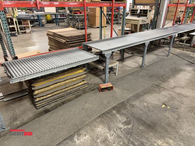 Lot 1-17506 - (1) electric lift table with custom roller top, 58" x 30", includes another roller table section tha...