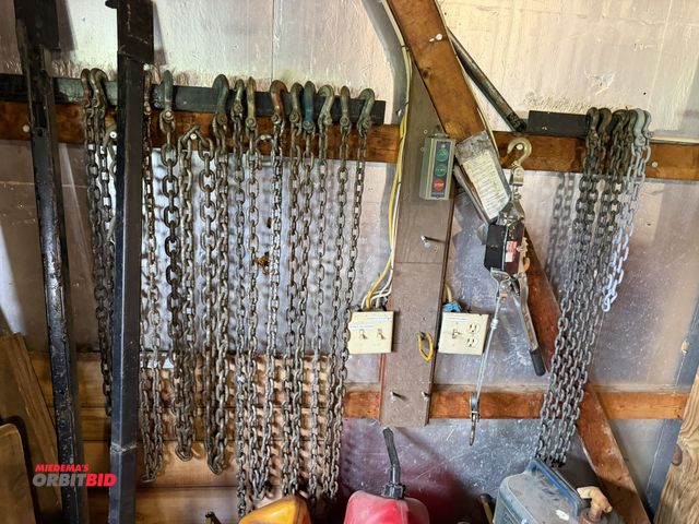 Lot 1-12330 - Lot of assorted chains with hook ends, and (1) cable winch puller, 4000 lb. capacity.