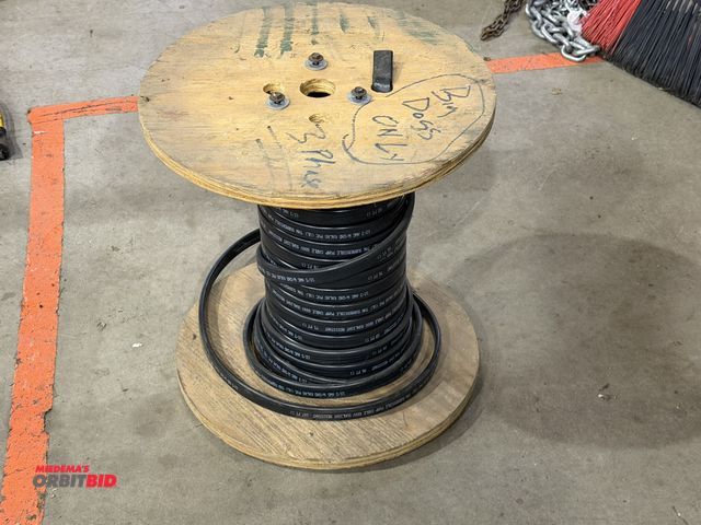 Lot 1-18597 - (1) spool of approx. 100' of 12/3 AWG W/GND submersible pump cable (600V, sunlight resistant).