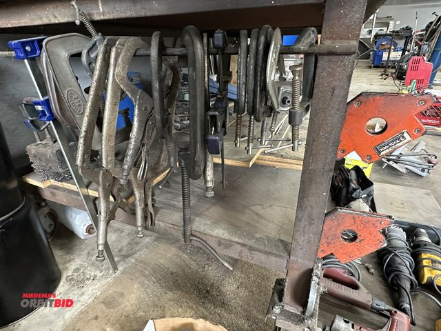 Lot 1-507 - Large lot of assorted C-clamps, sliding bar clamps, 3" C-clamps, vise grips, and welders right angle...