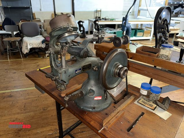 Lot 1-4664 - (1) United Shoe Machinery Corporation, model B, eyeleting machine, model 1049, Singer power table, b...