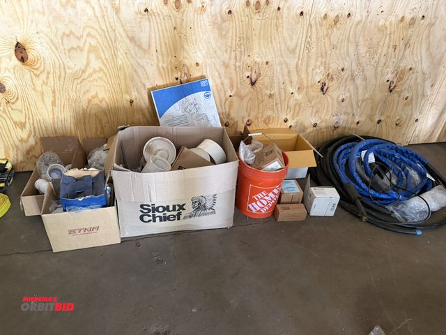 Lot 1-13167 - Large lot of assorted new and used plumbing items, and hoses, includes caps, filters, couplings, met...