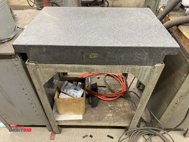 Lot 1-1770 - (1) black granite surface plate, 30" x 20" x approx. 4.5", with heavy duty steel frame.