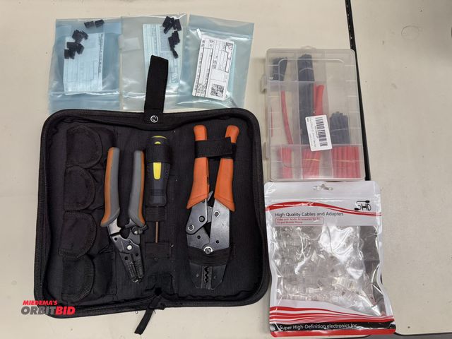 Lot 1-1094 - (1) Canvas electronics cutter, (1) Phillips screw driver, and (1) set of crimpers with assorted head...