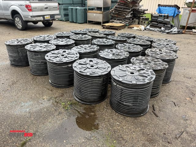 Lot 1-18730 - Lot of (25) spools of 1" heavy duty rubber hose, 1" OD with 1/4" wall, approx. 5/8" center diameter,...