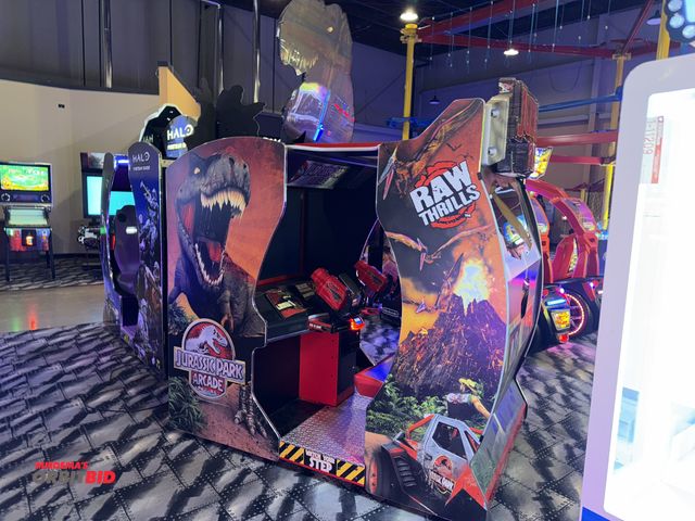 Lot 1-11210 - (1) Raw Thrills Jurassic Park Arcade style game, S/N Jurassic-4989, 120V, 2-player, 55" screen, unit...