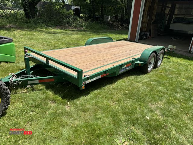 Lot 1-3223 - 2010 Sure-Trac Tandem Axle Equipment Trailer 2-5/16" ball hitch with ramps, sells with registration ...