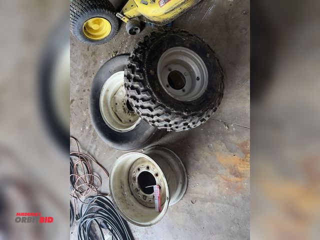 Lot 1-19904 - (1) 8-bolt implement rim, 17.5" diameter - outside to outside is 12" wide, (1) 6-bolt rim and tire, ...