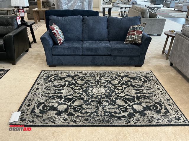 Lot 1-17187 - Navy Blue fabric sofa with rolled arms, measuring approximately 80”Wx38”Hx38”D and area rug measurin...