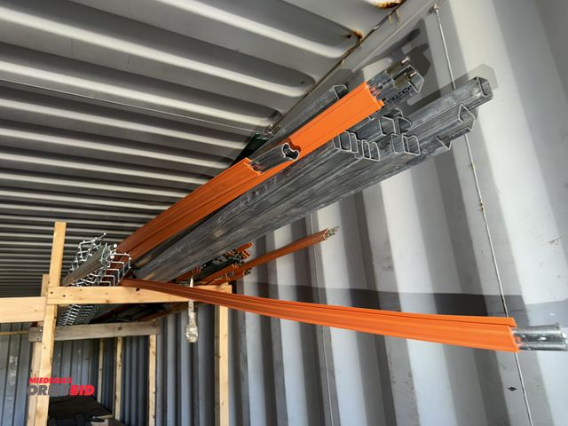 Lot 1-2984 - Lot of assorted electric pieces for overhead bridge cranes, includes electric strips, and metal brac...