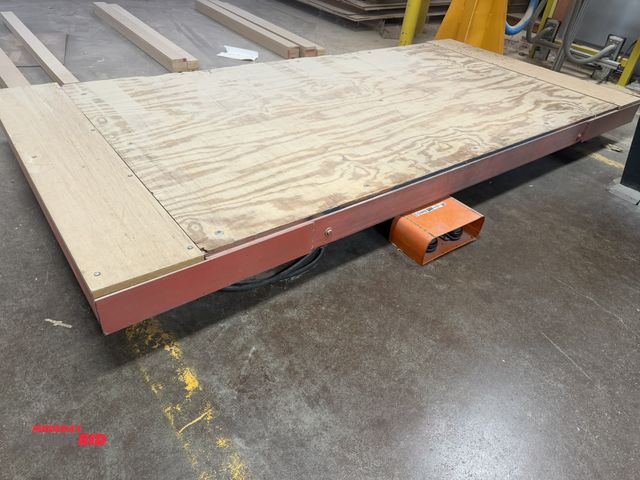 Lot 1-16550 - (1) American electric lift table with foot pedal control, 104" long x 48" wide, winning bidder respo...