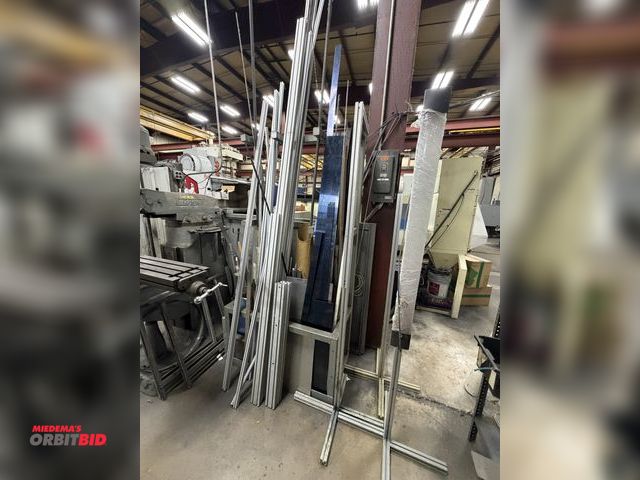 Lot 1-15349 - Large lot of assorted scrap metal, includes round stock, flat stock, structural aluminum, hinges, an...