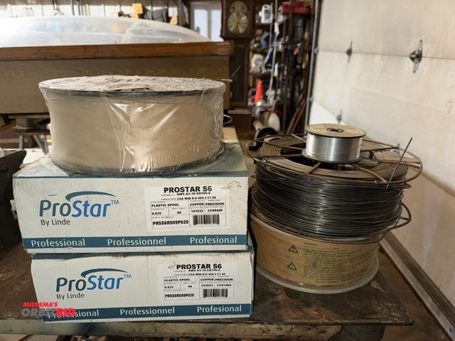 Lot 1-1501 - Lot of (8) assorted rolls of welding wire, includes (3) new boxes of Prostar S6 .035" diameter coppe...