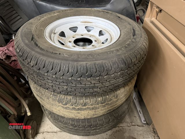 Lot 1-1466 - Lot of (3) Karrier-KR35 Load Star, size ST235/18R16 trailer tires with 8-lug rim.