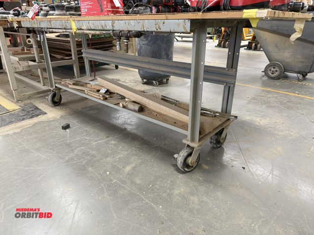 Lot 1-16166 - (1) 72" width x 33.5" height x 29" depth, 2-tier steel work bench locking 6" swivel casters, attache...