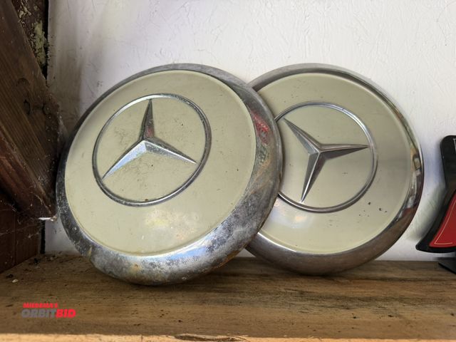 Lot 1-8192 - Set of (2) original 9" diameter Mercedes Benz hub caps (from an early 70's model Mercedes 280 Series...