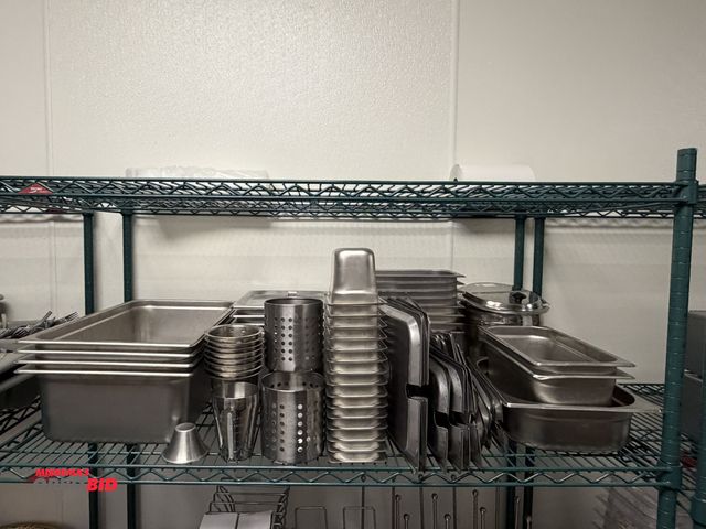 Lot 1-11132 - Content of shelf shown in photo, with assorted stainless steel items, includes (4) full size hotel p...