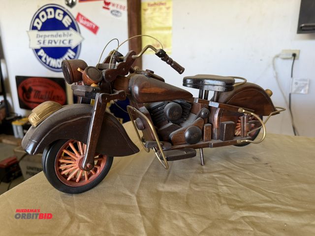 Lot 1-8227 - (1) collectible 16" long wood motorcycle.