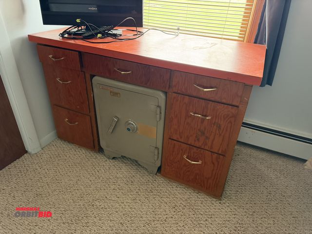 Lot 1-12163 - (1) custom wood desk, 48" x 23", with Formica top, does not include contents, desk only.