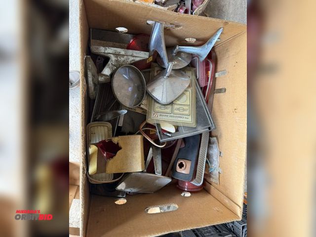 Lot 1-8567 - Large lot of assorted vintage Chevy car parts.