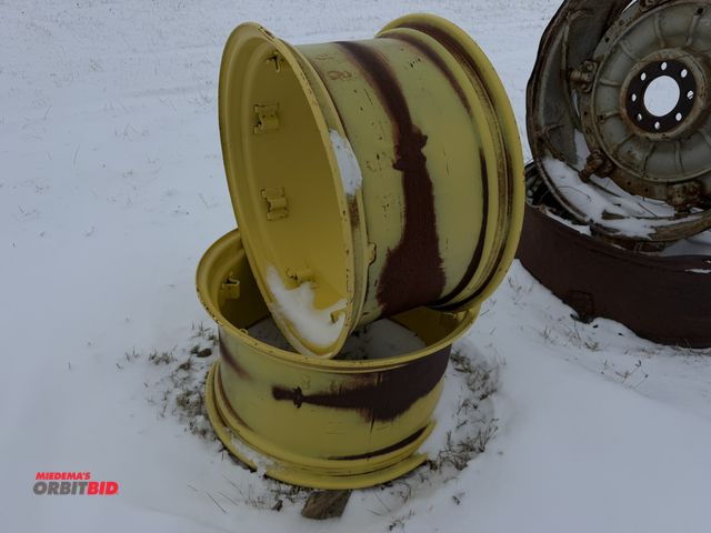 Lot 1-11657 - Lot of (2) clamp on dual tire rims, approx. 25.5" diameter, 15" from inside of bead to inside of bea...