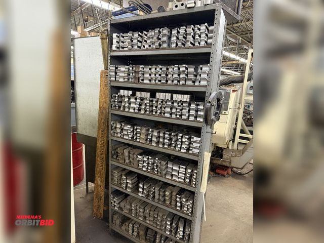 Lot 1-1753 - (1) 36" x 12" deep adjustable metal shelving unit with assorted soft chuck jaws.