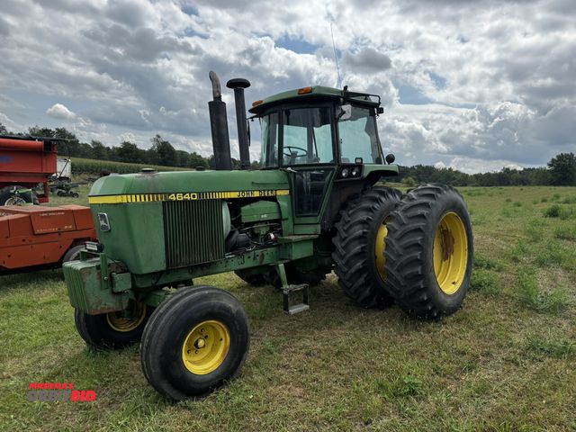 Lot 1-19733 - (1) John Deere 4640, 2WD tractor, 12,833 metered hours showing, cab with heat and air, Power Shift f...