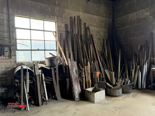 Lot 1-18102 - Large lot of assorted scrap steel, includes various angle, various sizes of pipe, solid cut offs, C-...