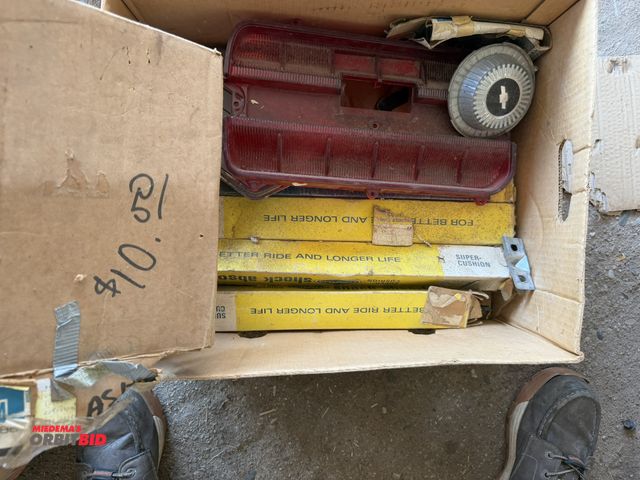 Lot 1-8553 - Lot of assorted vintage Chevy truck items, includes 1964 headlight trim, and other miscellaneous car...