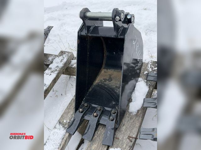 Lot 1-11704 - (1) new 3-tine backhoe bucket, approx. 9.5" wide, S/N 200829001, attachment bracket is approx. 5 1/4...