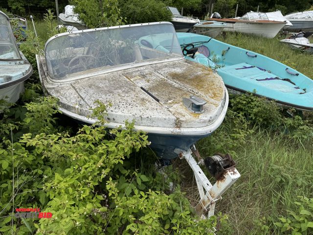 Lot 1-6625 - (1) 14' boat with partial outboard boat motor, no visible Hull ID #, #MC7551SL, winning bidder respo...