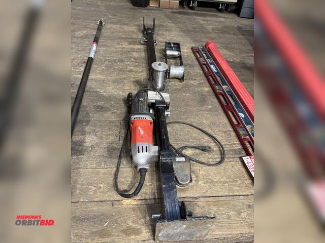 Lot 1-4330 - (1) Milwaukee Super Hawg wire pulling drill with foot pedal control, 115V, includes attachments.