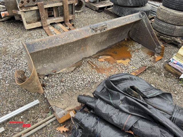 Lot 1-16040 - (1) 7' long bucket for a skid steer with BOCE, needs right side repaired before use, steel is torn a...