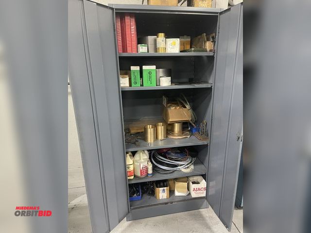 Lot 1-19276 - (1) 2-door metal storage cabinet, 36" x 24" x 78.5" tall, includes contents of shims, copper sleeves...