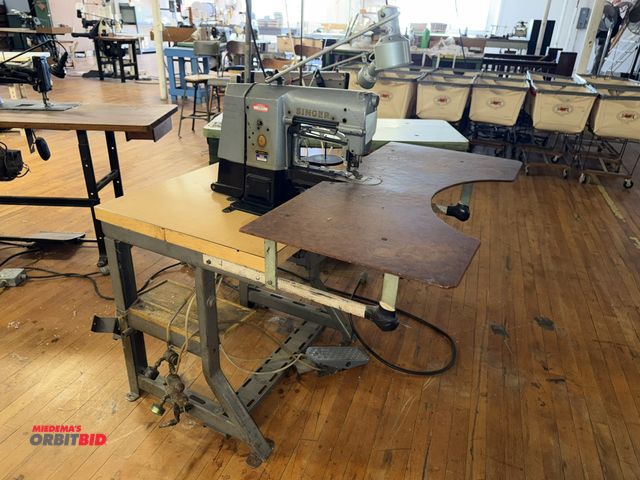 Lot 1-4669 - (1) Singer, model 269W9, commercial sewing machine, mounted on a Singer power table, 1/2 HP, foot pe...