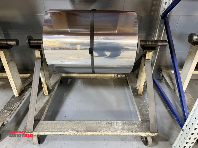 Lot 1-18703 - (1) 24" wide partial roll of bright aluminum, .016" thickness, 151 lb. of net weight, includes cart,...