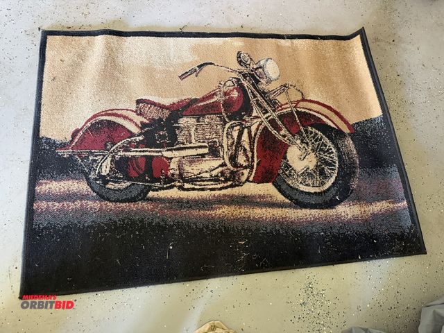 Lot 1-8213 - (1) approx. 54" width x 39" height motorcycle themed rug.