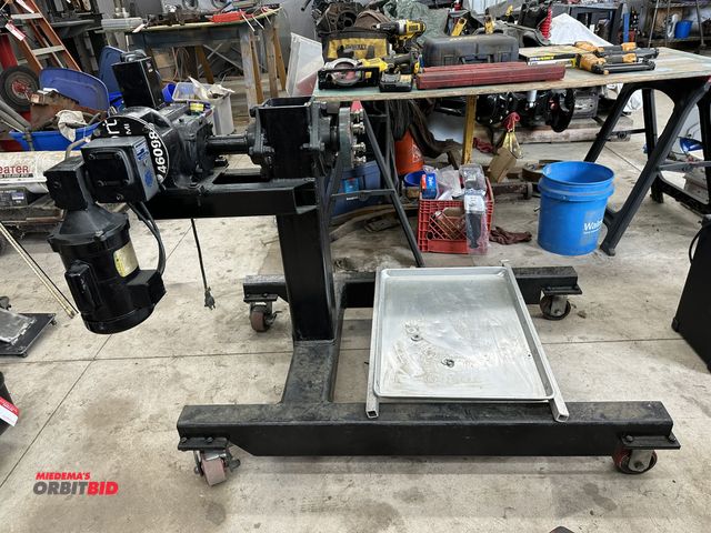 Lot 1-563 - (1) engine stand with electric motor and gear reducer, 120V, on casters.