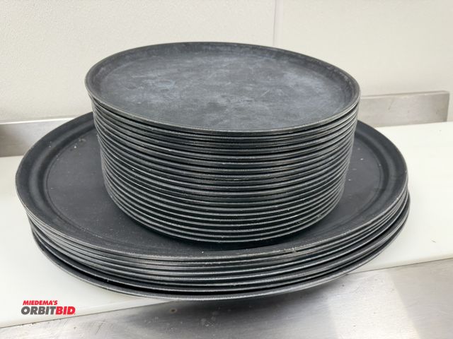 Lot 1-11125 - Lot including (20) Winco 16" plastic serving trays, and (8) Winco, model TFG-2622K, 27" oval plastic...