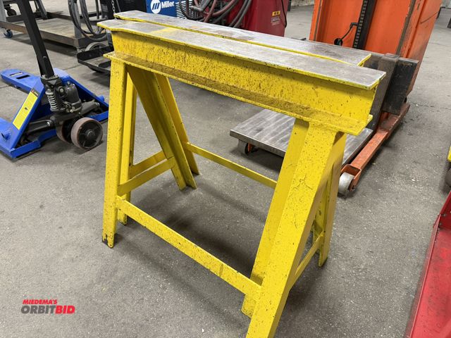 Lot 1-15325 - (1) pair of heavy duty saw horses, I-beam construction, 33" length x 4" width x 31.5" height.